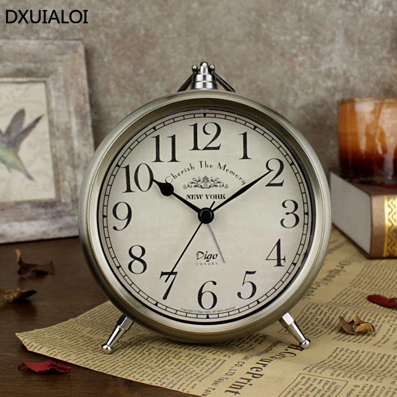 DXUIALOI ريترو بسيط طالب عنبر  - مراجعة Vintage Alarm Clock وسعره